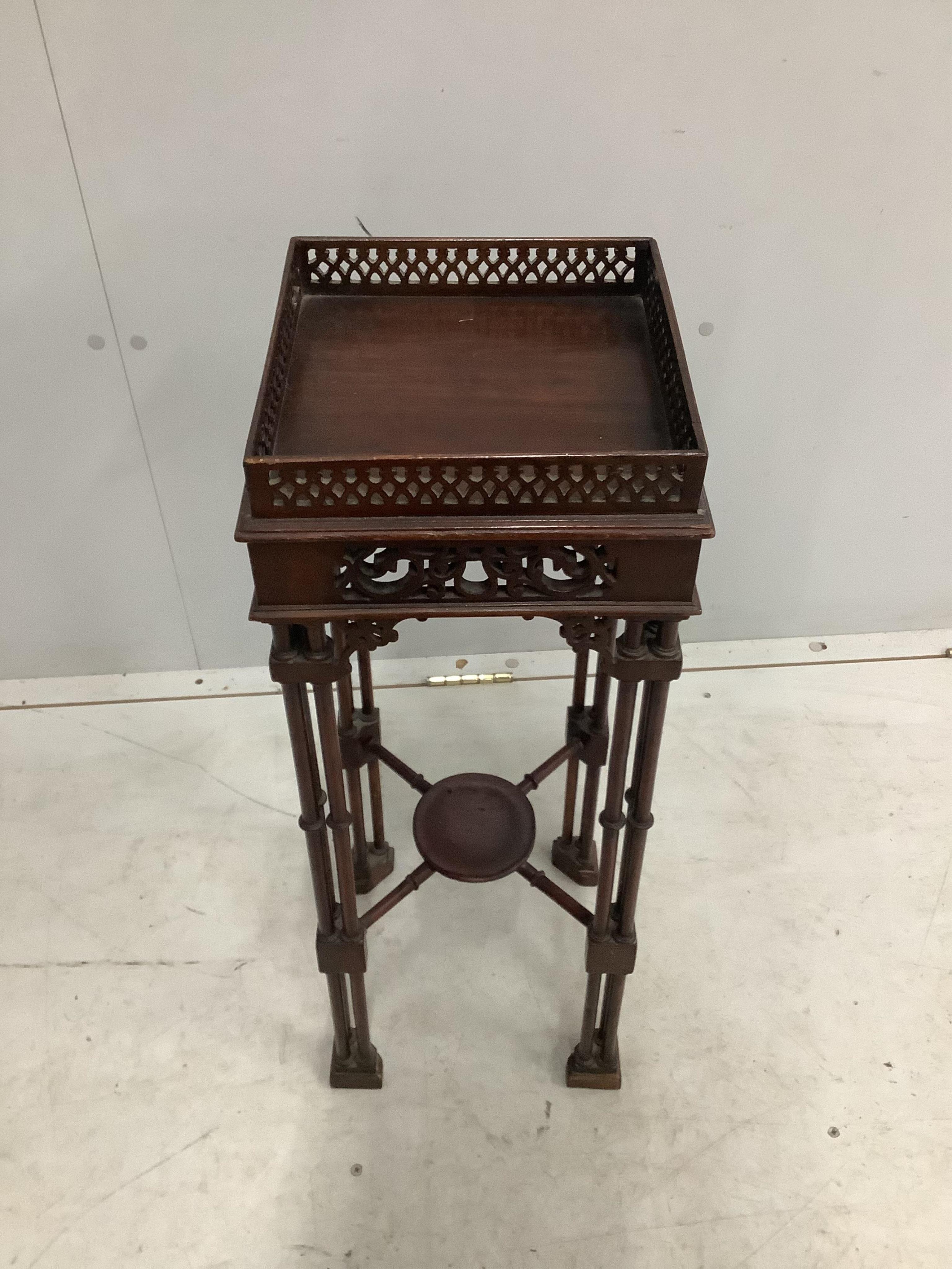 A Chippendale revival mahogany occasional table, width 25cm, height 72cm. Condition - poor to fair, damage to blind fret